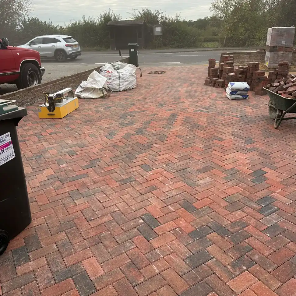 Block-paved courtyard with outdoor furniture